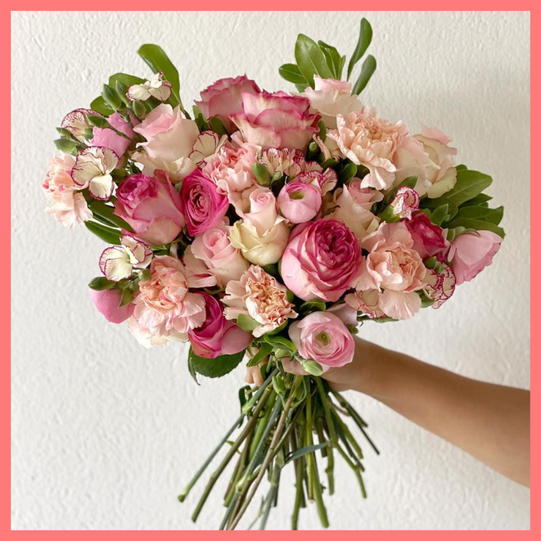 Order The Hillery Flower Bouquet from our Spring Collection! The Hillery bouquet includes mixed stems of light pink roses, light pink ranunculus, brilliantina, light pink carnations, and solomio. The flowers will be shipped directly from the farm to you!