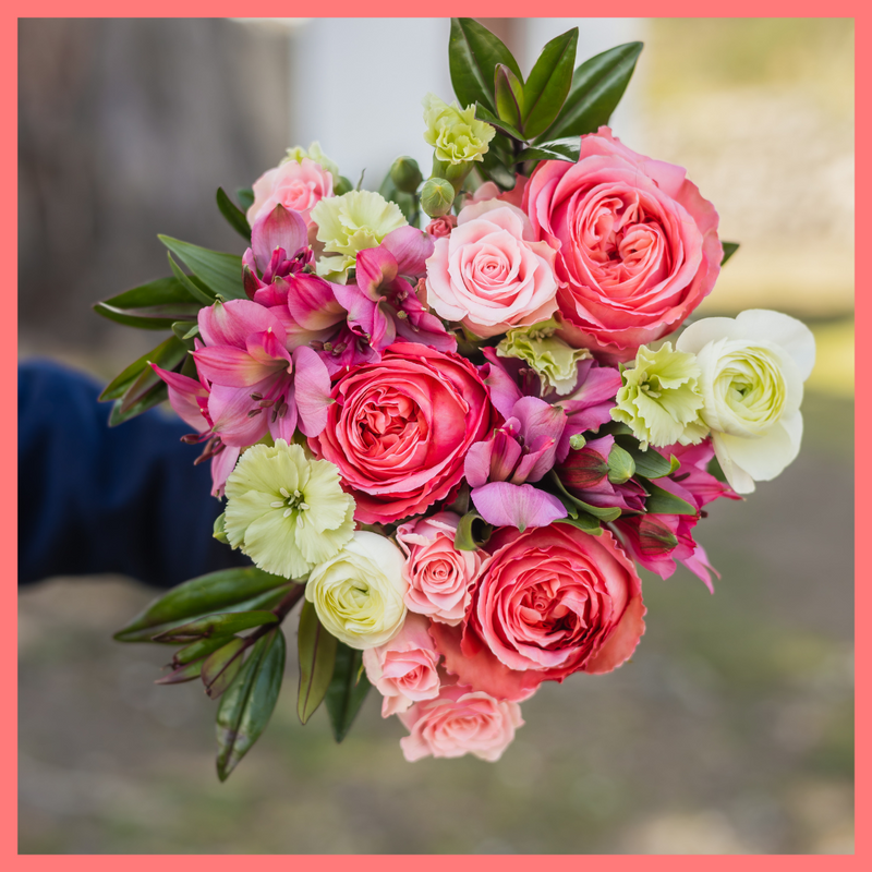 Order the Thinking of You flower bouquet! The Thinking of You bouquet includes mixed stems of roses, spray roses, solomio, alstroemeria, and ranunculus. The flowers will be shipped directly from the farm to you!