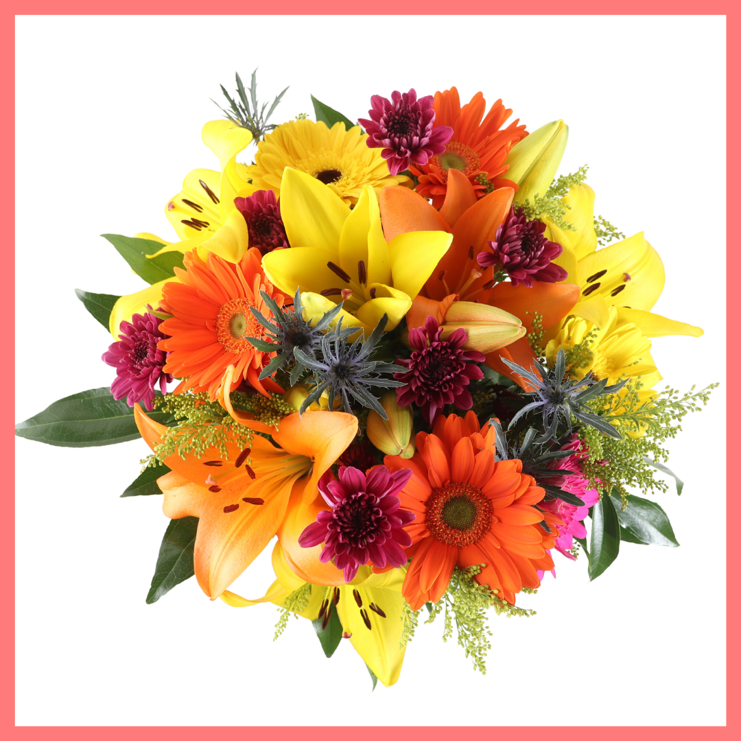 The Autumn Vibes bouquet includes mixed stems of lilies, gerbera daisies, CDN pompoms, eryngium, cocculus, aster, and pittosporum!