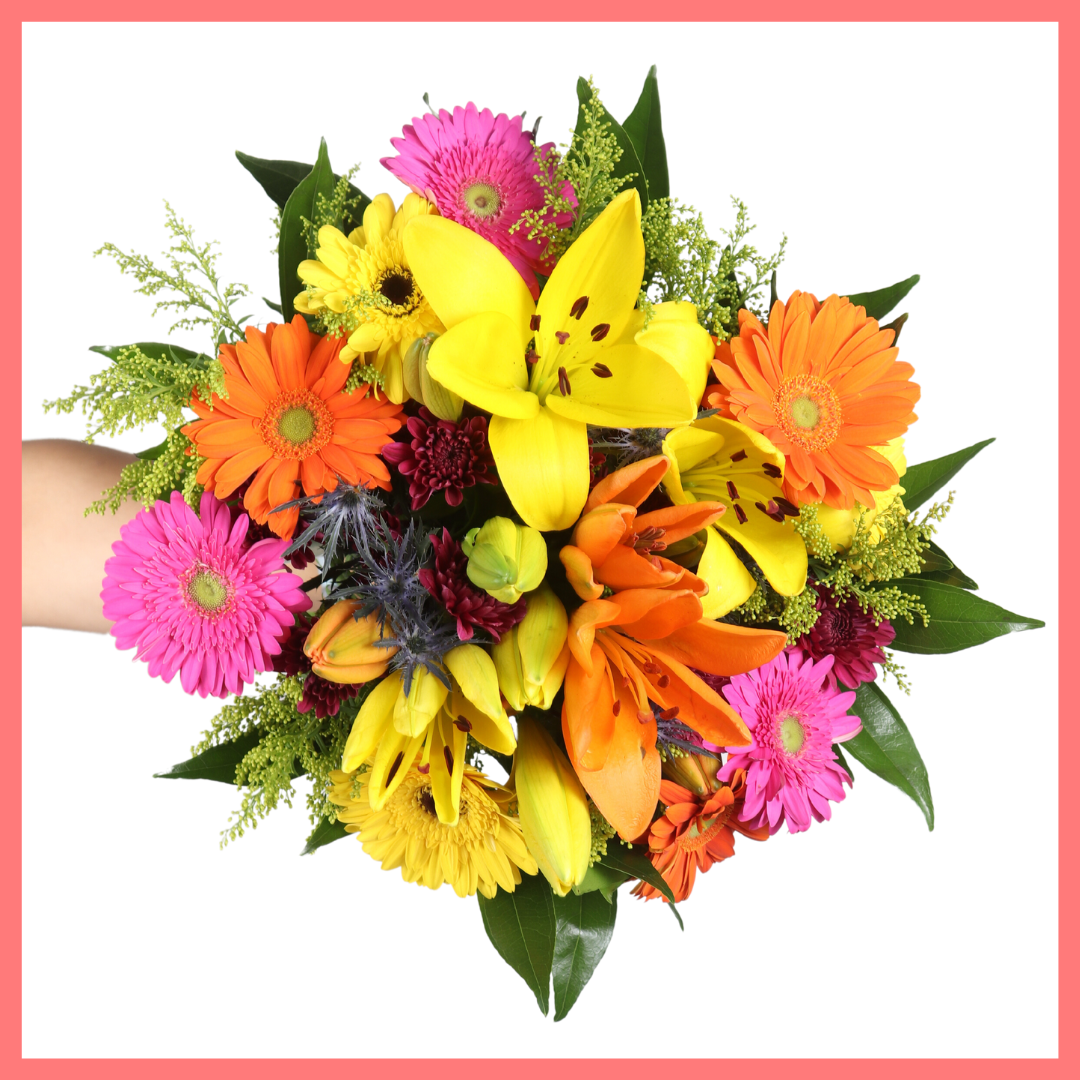 The Autumn Vibes bouquet includes mixed stems of lilies, gerbera daisies, CDN pompoms, eryngium, cocculus, aster, and pittosporum!