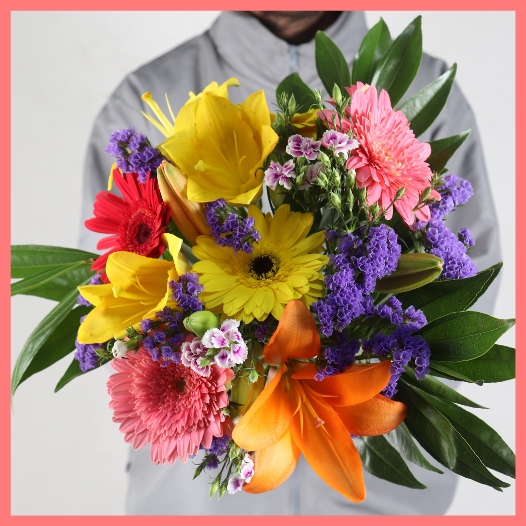 The Be My Baby bouquet includes mixed stems of lilies, gerbera daisies, pompons, photinia, and brillantina! Please note that as flowers are a live product, colors, and varieties may slightly vary from the photos shown to provide you with the freshest and most beautiful bouquet.