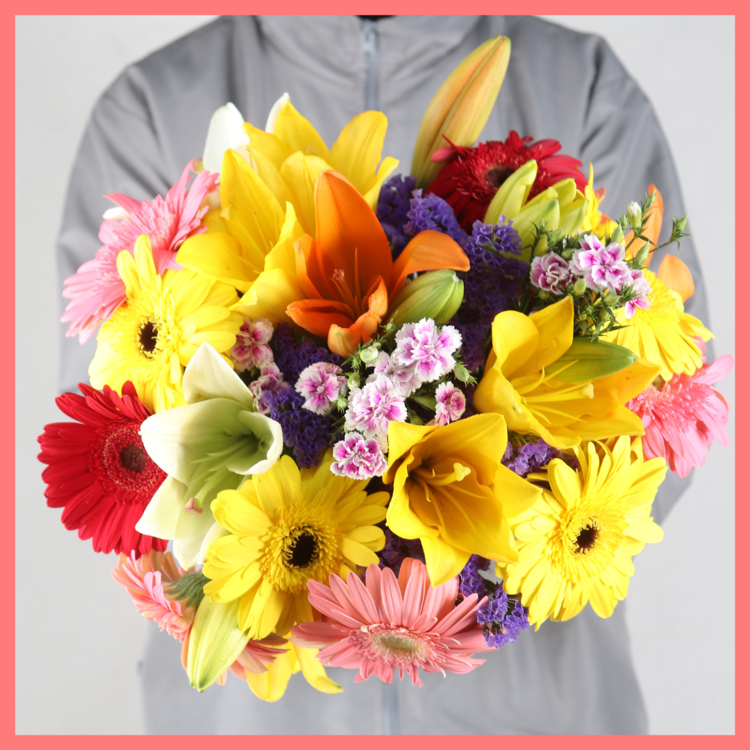 The Be My Baby bouquet includes mixed stems of lilies, gerbera daisies, pompons, photinia, and brillantina! Please note that as flowers are a live product, colors, and varieties may slightly vary from the photos shown to provide you with the freshest and most beautiful bouquet.