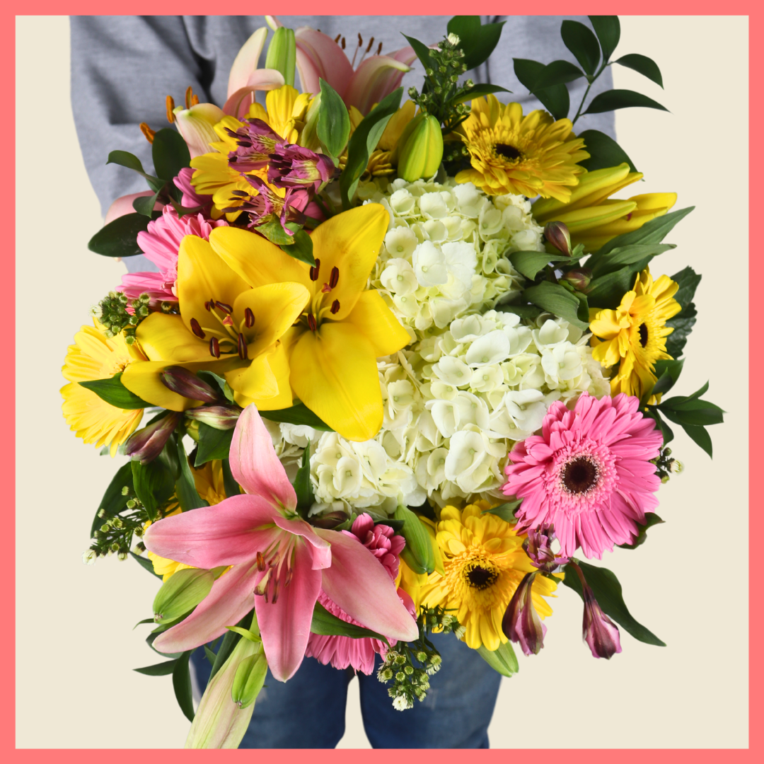 The Eden Garden bouquet includes mixed stems of lilies, hydrangea, gerbera daisies, alstroemeria, aster, and ruscus!Please note that as flowers are a live product, colors, and varieties may slightly vary from the photos shown to provide you with the freshest and most beautiful bouquet.