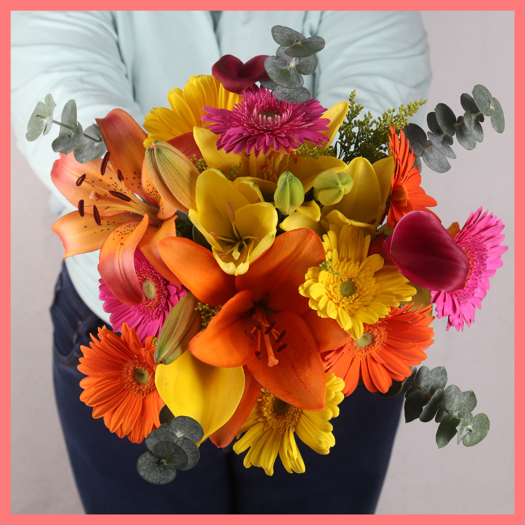 The Fall Breeze bouquet includes mixed stems of eucalyptus, lilies, gerbera daisies, mini calla lilies, and aster! Please note that as flowers are a live product, colors, and varieties may slightly vary from the photos shown to provide you with the freshest and most beautiful bouquet.
