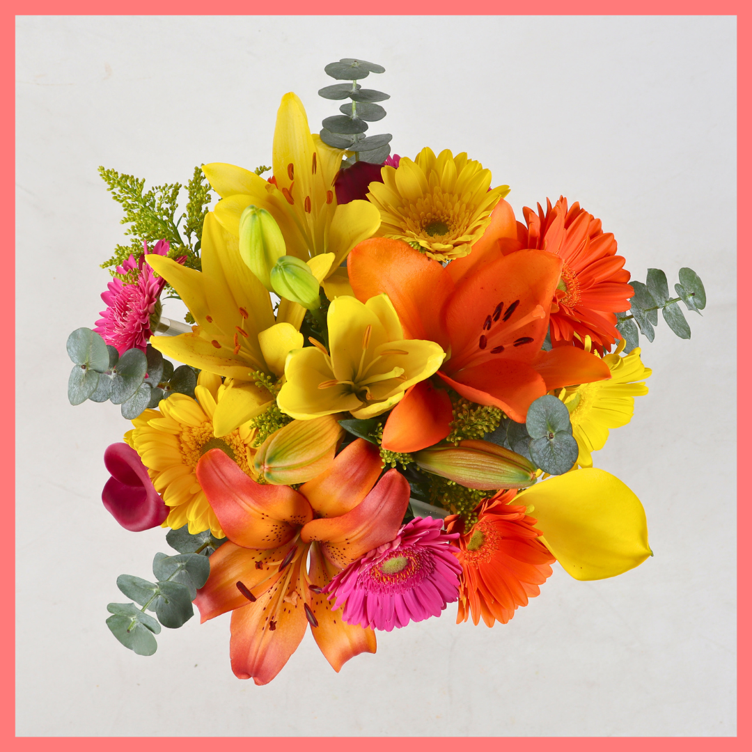 The Fall Breeze bouquet includes mixed stems of eucalyptus, lilies, gerbera daisies, mini calla lilies, and aster! Please note that as flowers are a live product, colors, and varieties may slightly vary from the photos shown to provide you with the freshest and most beautiful bouquet.