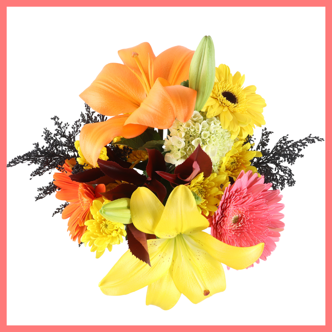 The Fall Festival bouquet includes mixed stems of mini hydrangea, lilies, gerbera daisies, CDN pompoms, aster, and photinia!