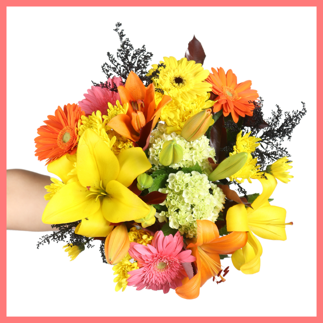 The Fall Festival bouquet includes mixed stems of mini hydrangea, lilies, gerbera daisies, CDN pompoms, aster, and photinia!