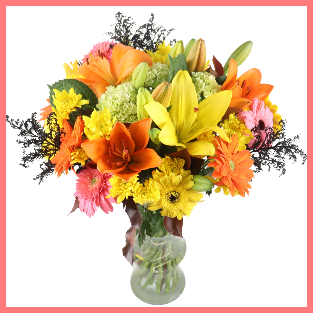The Fall Festival bouquet includes mixed stems of mini hydrangea, lilies, gerbera daisies, CDN pompoms, aster, and photinia!