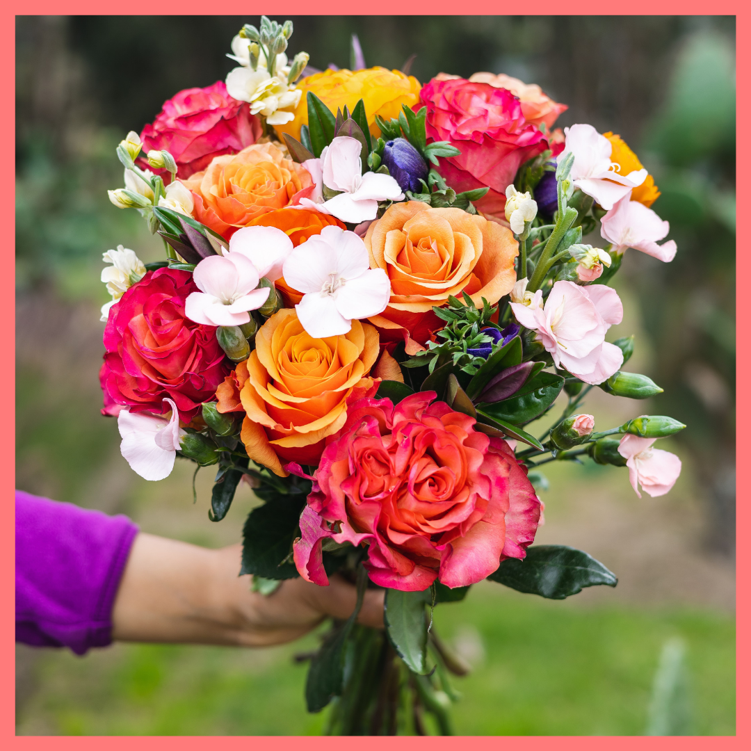 The Feast Your Eyes flower bouquet includes mixed stems of anemones, ranunculus, solomio, stock, hebes, and roses. Please note that as flowers are a live product, colors and varieties may slightly vary from the photos shown to provide you with the freshest and most beautiful bouquet.