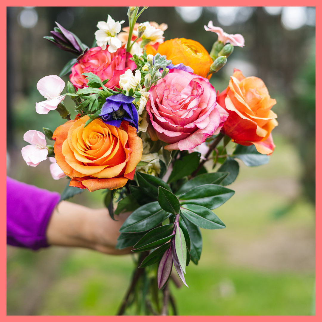 The Feast Your Eyes flower bouquet includes mixed stems of anemones, ranunculus, solomio, stock, hebes, and roses. Please note that as flowers are a live product, colors and varieties may slightly vary from the photos shown to provide you with the freshest and most beautiful bouquet.