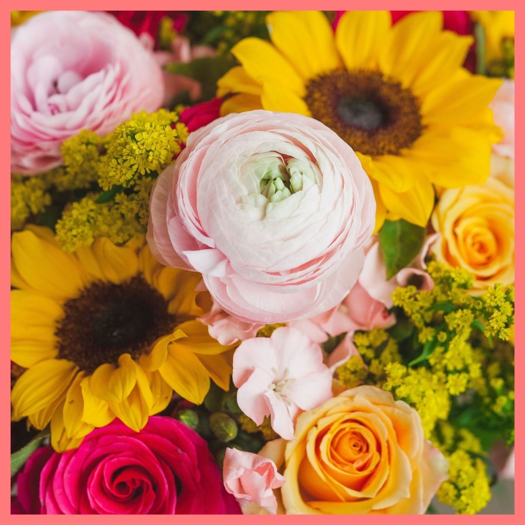 Order the Here Comes The Sun(flower) flower bouquet! The Here Comes The Sun(flower) bouquet includes mixed stems of sunflowers, ranunculus, roses, solomio, and solidago.The flowers will be shipped directly from the farm to you!