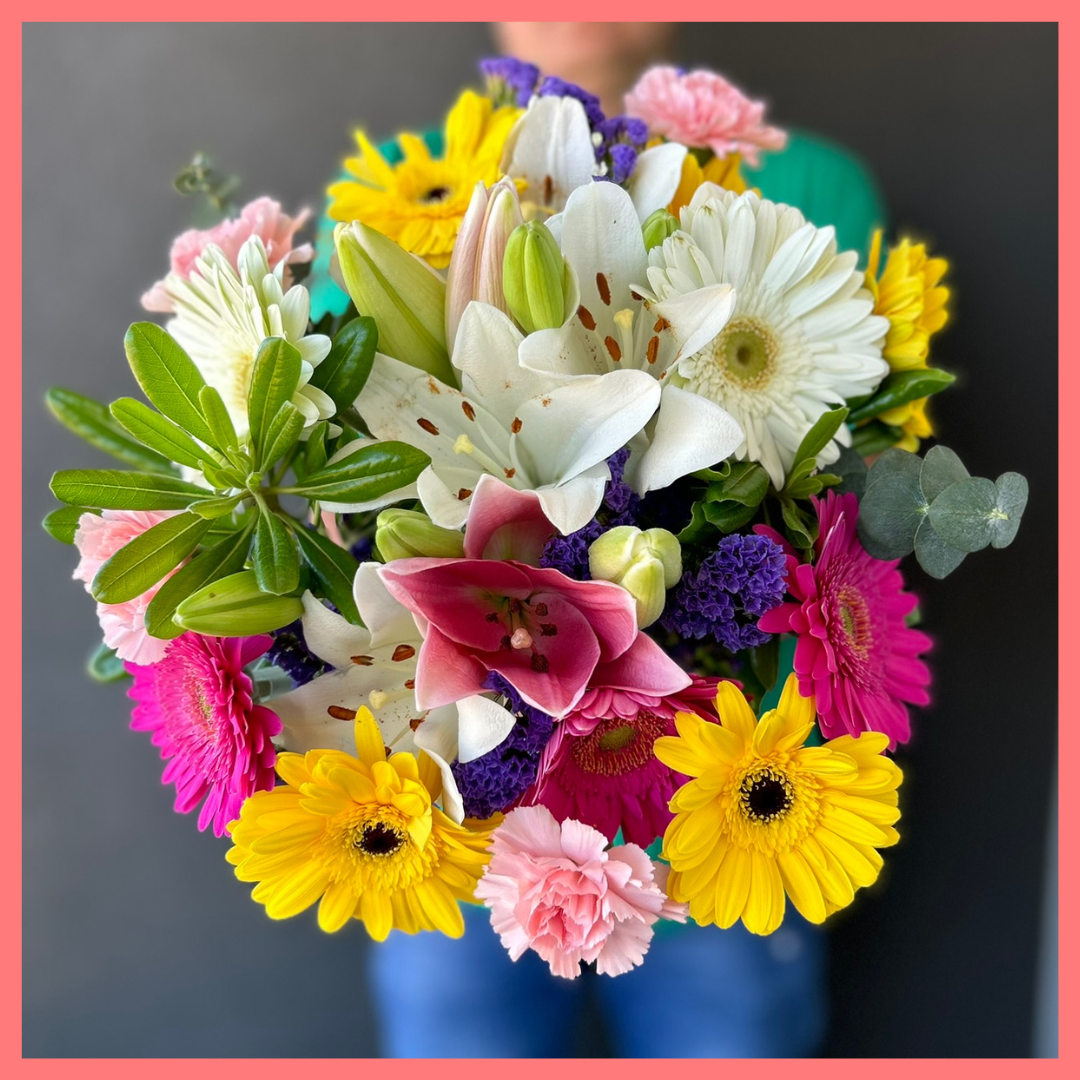 The Love To Love You bouquet includes mixed stems of eucalyptus, gerbera daisies, mini carnations, statice, and lilies! Please note that as flowers are a live product, colors and varieties may slightly vary from the photos shown to provide you with the freshest and most beautiful bouquet.