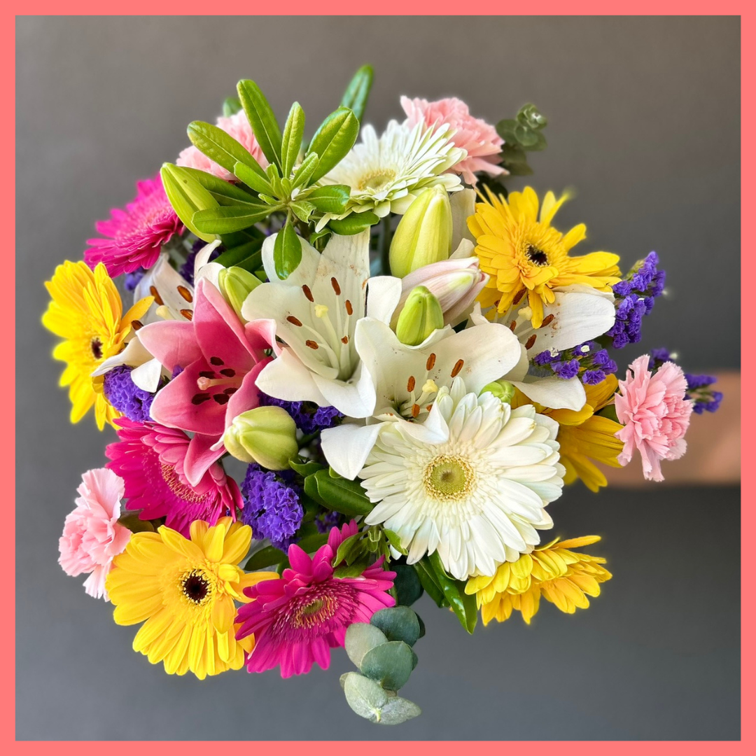 The Love To Love You bouquet includes mixed stems of eucalyptus, gerbera daisies, mini carnations, statice, and lilies! Please note that as flowers are a live product, colors and varieties may slightly vary from the photos shown to provide you with the freshest and most beautiful bouquet.