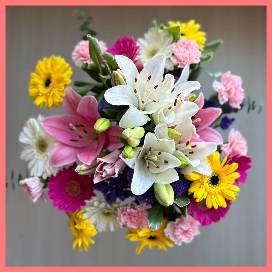 The Love To Love You bouquet includes mixed stems of eucalyptus, gerbera daisies, mini carnations, statice, and lilies! Please note that as flowers are a live product, colors and varieties may slightly vary from the photos shown to provide you with the freshest and most beautiful bouquet.