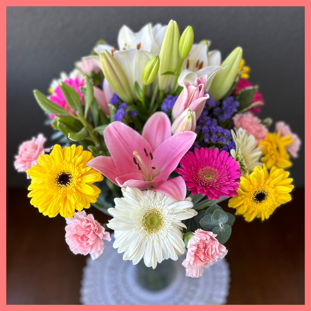 The Love To Love You bouquet includes mixed stems of eucalyptus, gerbera daisies, mini carnations, statice, and lilies! Please note that as flowers are a live product, colors and varieties may slightly vary from the photos shown to provide you with the freshest and most beautiful bouquet.