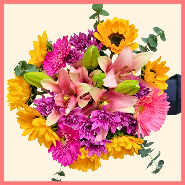 The Pink Sun bouquet includes mixed stems of sunflowers, lilies, gerbera daisies, pompons, and eucalyptus! Please note that as flowers are a live product, colors, and varieties may slightly vary from the photos shown to provide you with the freshest and most beautiful bouquet.