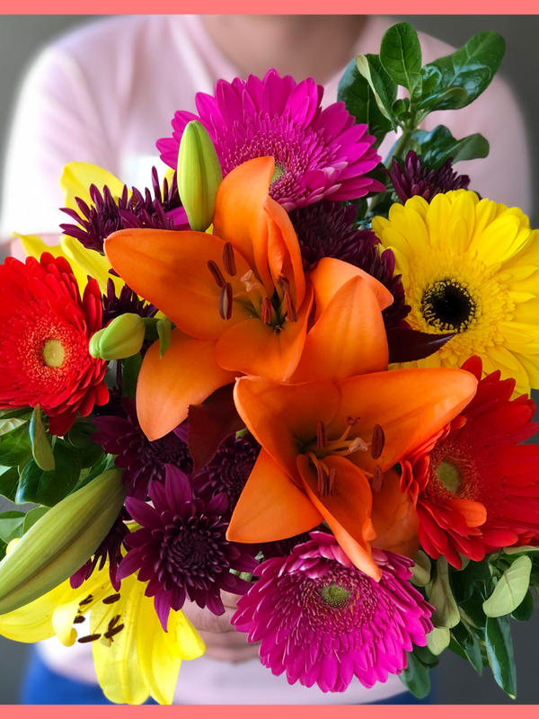  The Rainbow Snowcone bouquet includes mixed stems of lilies, gerbera daisies, CDN pompoms, photinia, and brillantina!