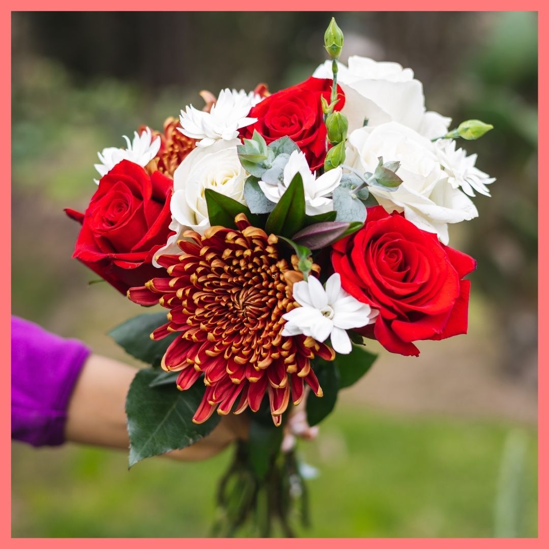 Order the Jingle Jingle Christmas flower bouquet! The Jingle Jingle flower bouquet includes mixed stems of roses, scabiosa, chrysanthemums, solomio, hebes, and eucalyptus. The flowers will be shipped directly from the farm to you!