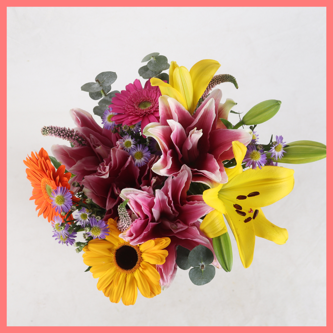 The Serenity bouquet includes mixed stems of rose lily, lily, gerbera, veronica, aster, and eucalyptus! Please note that as flowers are a live product, colors, and varieties may slightly vary from the photos shown to provide you with the freshest and most beautiful bouquet.