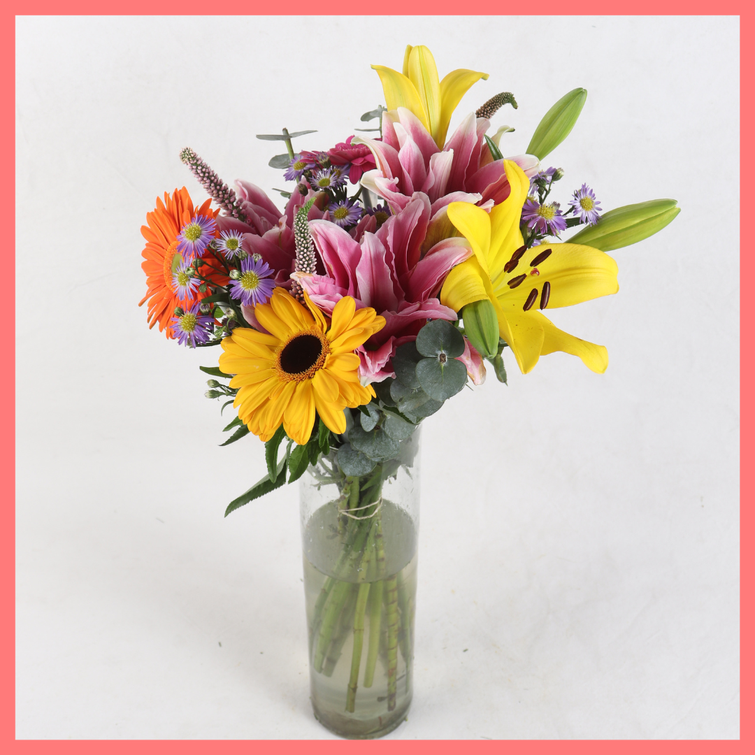 The Serenity bouquet includes mixed stems of rose lily, lily, gerbera, veronica, aster, and eucalyptus! Please note that as flowers are a live product, colors, and varieties may slightly vary from the photos shown to provide you with the freshest and most beautiful bouquet.