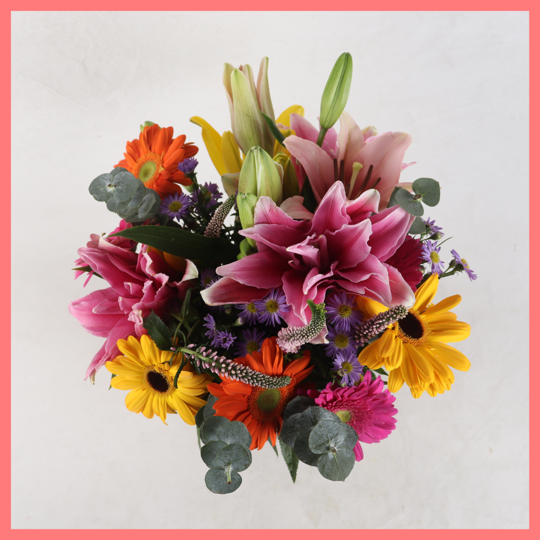 The Serenity bouquet includes mixed stems of rose lily, lily, gerbera, veronica, aster, and eucalyptus! Please note that as flowers are a live product, colors, and varieties may slightly vary from the photos shown to provide you with the freshest and most beautiful bouquet.