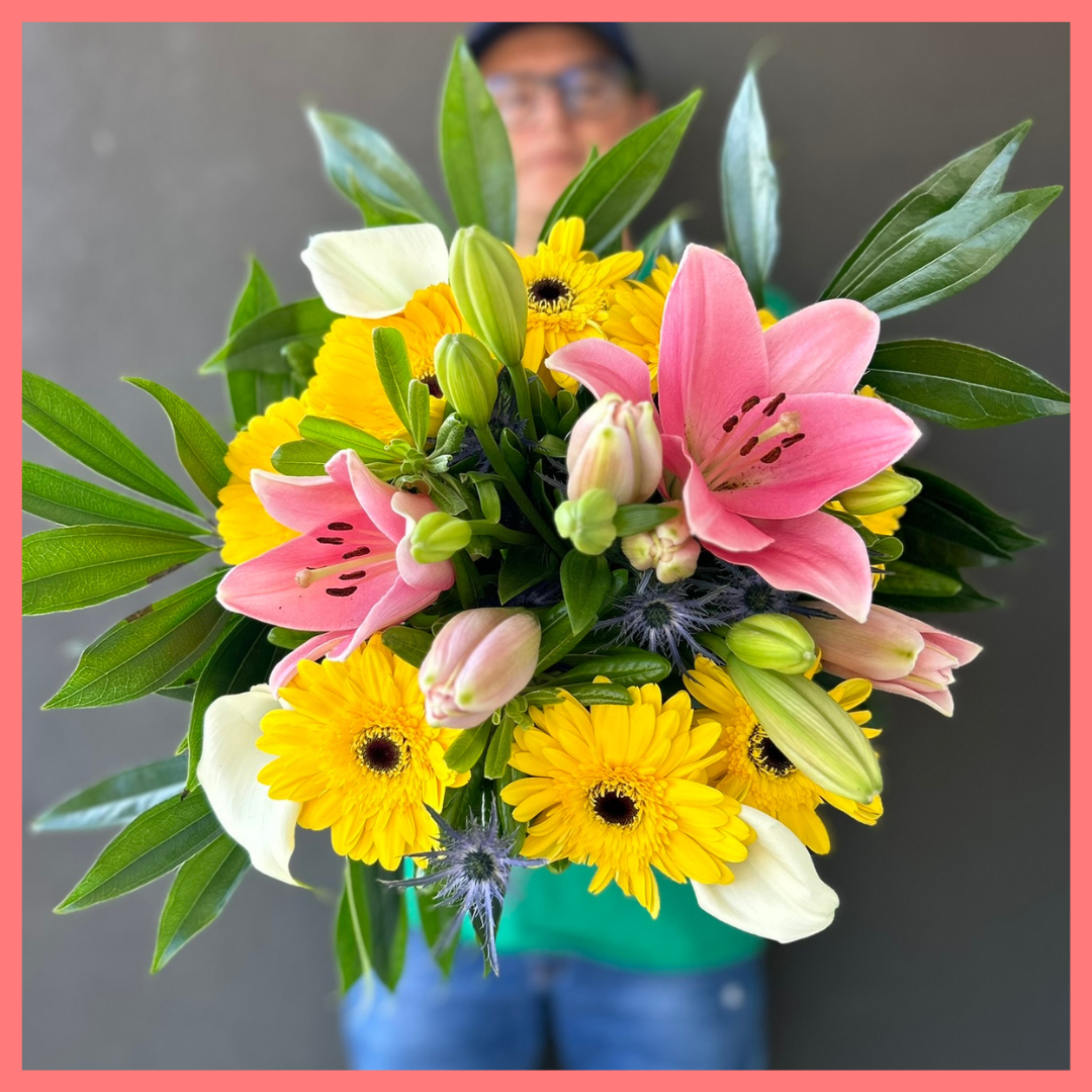 The XOXO bouquet includes mixed stems of lilies, gerbera daisies, mini calla lilies, eryngium, cocculus, and pittosporum! Please note that as flowers are a live product, colors, and varieties may slightly vary from the photos shown to provide you with the freshest and most beautiful bouquet.