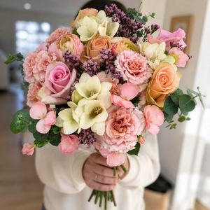Fresh Start flower bouquet with roses, spray roses, freesias, and ranunculus