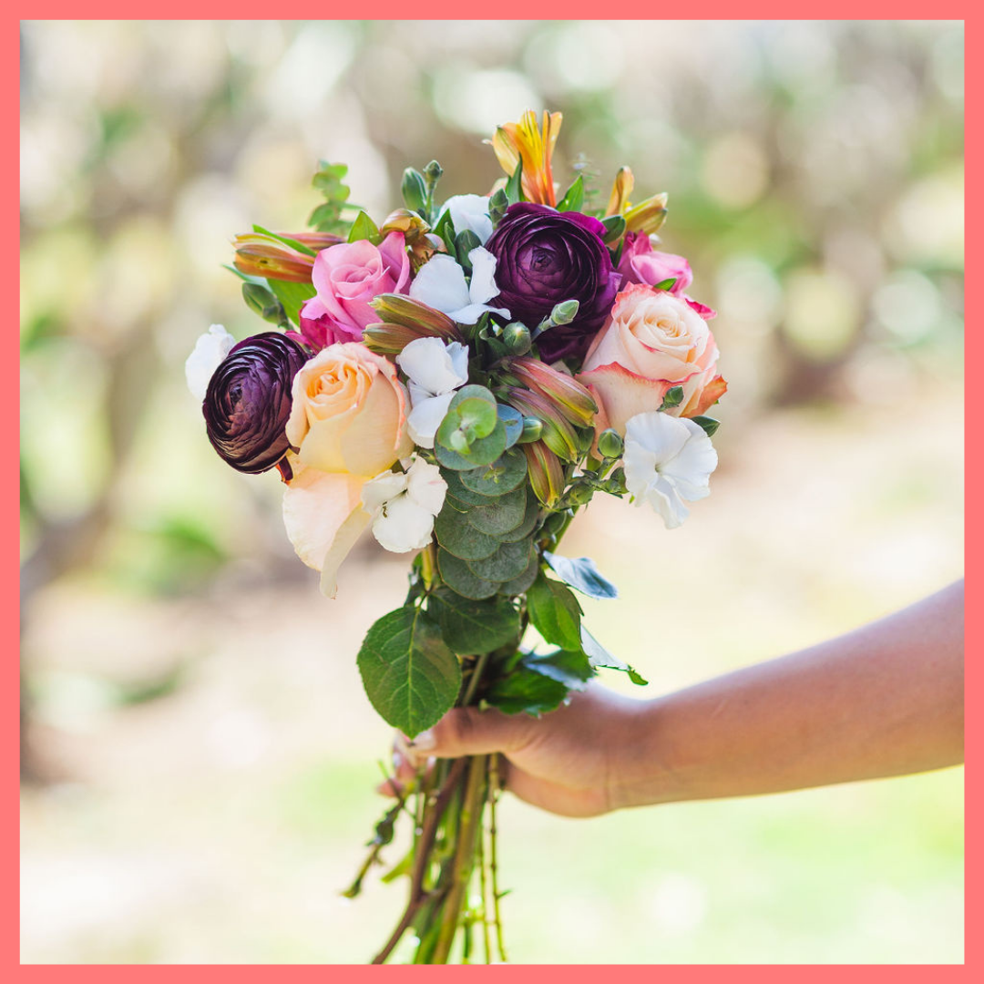 The Bundle of Joy flower bouquet includes mixed stems of ranunculus, roses, solomio, alstroemeria, and eucalyptus. Please note that as flowers are a live product, colors and varieties may slightly vary from the photos shown to provide you with the freshest and most beautiful bouquet.
