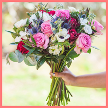 Load image into Gallery viewer, The Sweet Autumn flower bouquet includes mixed stems of anemones, eryngium, roses, solomio, eucalyptus, hebes, and stock. Please note that as flowers are a live product, colors and varieties may slightly vary from the photos shown to provide you with the freshest and most beautiful bouquet.
