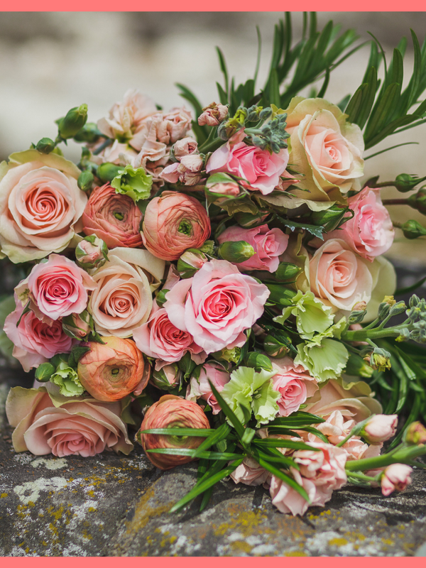 Order The Susie flower bouquet from our Mother's Day Collection.The Susie bouquet includes mixed stems of roses, coral ranunculus, stock, solomio, spray roses, and podocarpus greens. The flowers will be shipped directly from the farm to you!