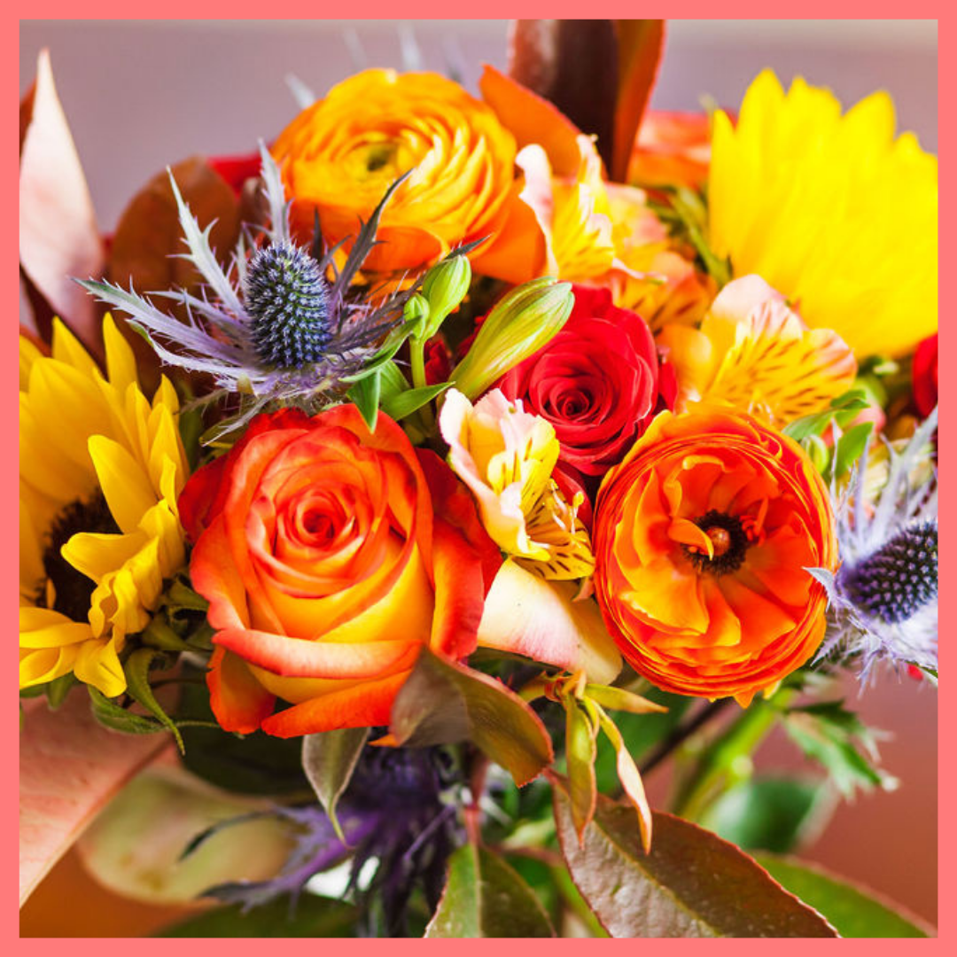 The Pumpkin Nice flower bouquet includes mixed stems of sunflowers, roses, ranunculus, alstroemeria, photinea, and eryngium. Please note that as flowers are a live product, colors and varieties may slightly vary from the photos shown to provide you with the freshest and most beautiful bouquet.