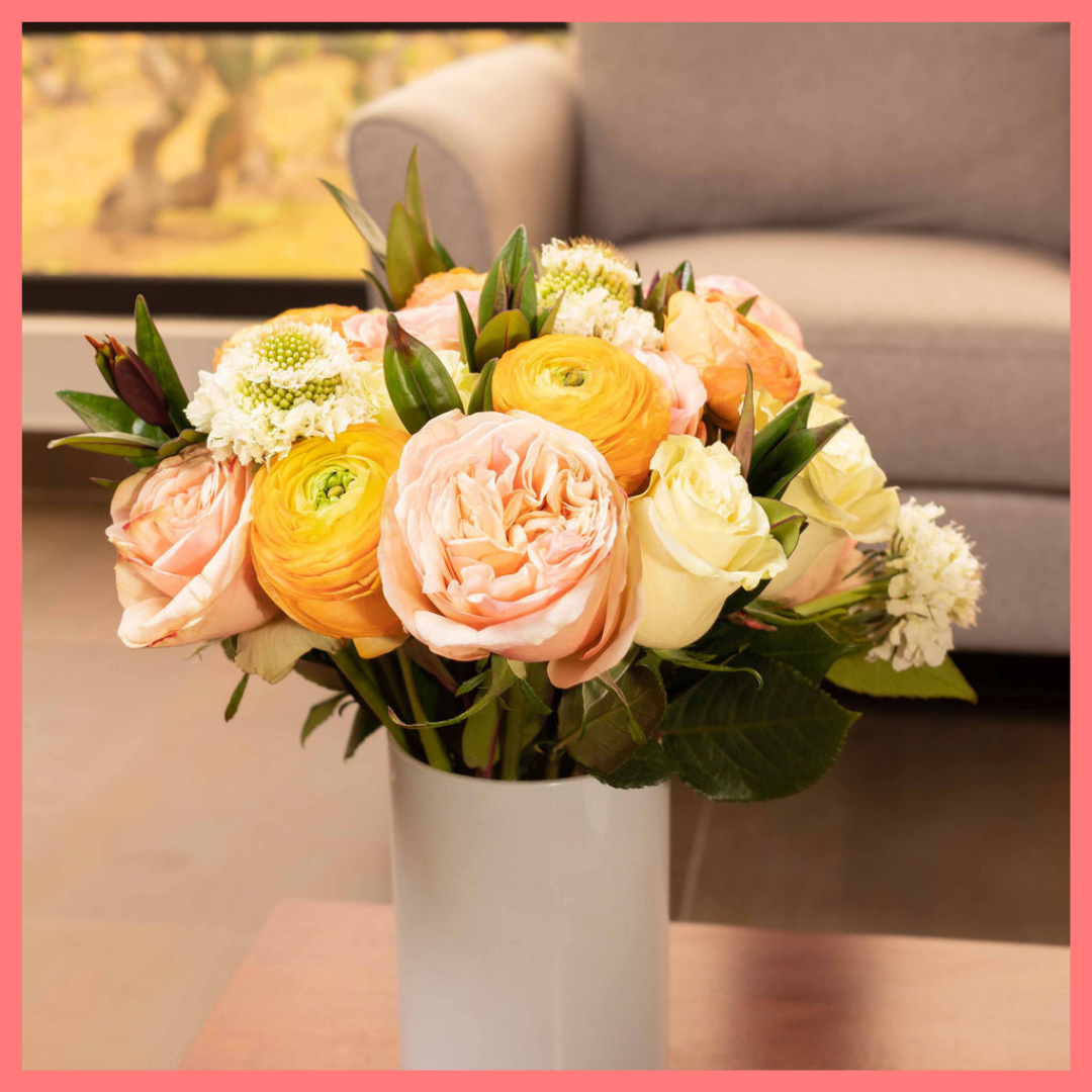 Order the Bright and Toasty flower bouquet! The Bright and Toasty bouquet includes mixed stems of roses, ranunculus, scabiosa, solomio, and hebes. The flowers will be shipped directly from the farm to you!