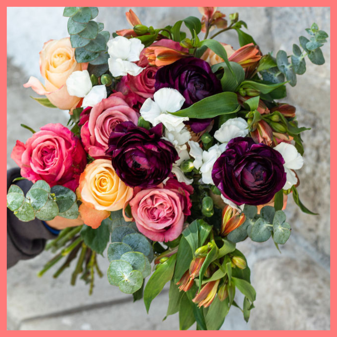 The Bundle of Joy bouquet includes mixed stems of ranunculus, roses, solomio, alstroemeria, and eucalyptus. Please note that as flowers are a live product, colors and varieties may slightly vary from the photos shown to provide you with the freshest and most beautiful bouquet.