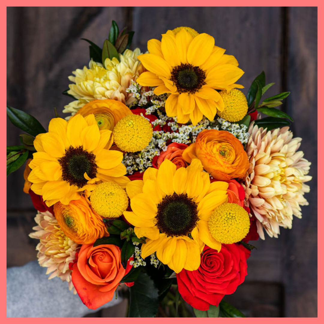 The Falling in Love bouquet includes mixed stems of sunflower, roses, chrysanthemums, ranunculus, craspedia, hebes, and limonium! Please note that as flowers are a live product, colors and varieties may slightly vary from the photos shown to provide you with the freshest and most beautiful bouquet.