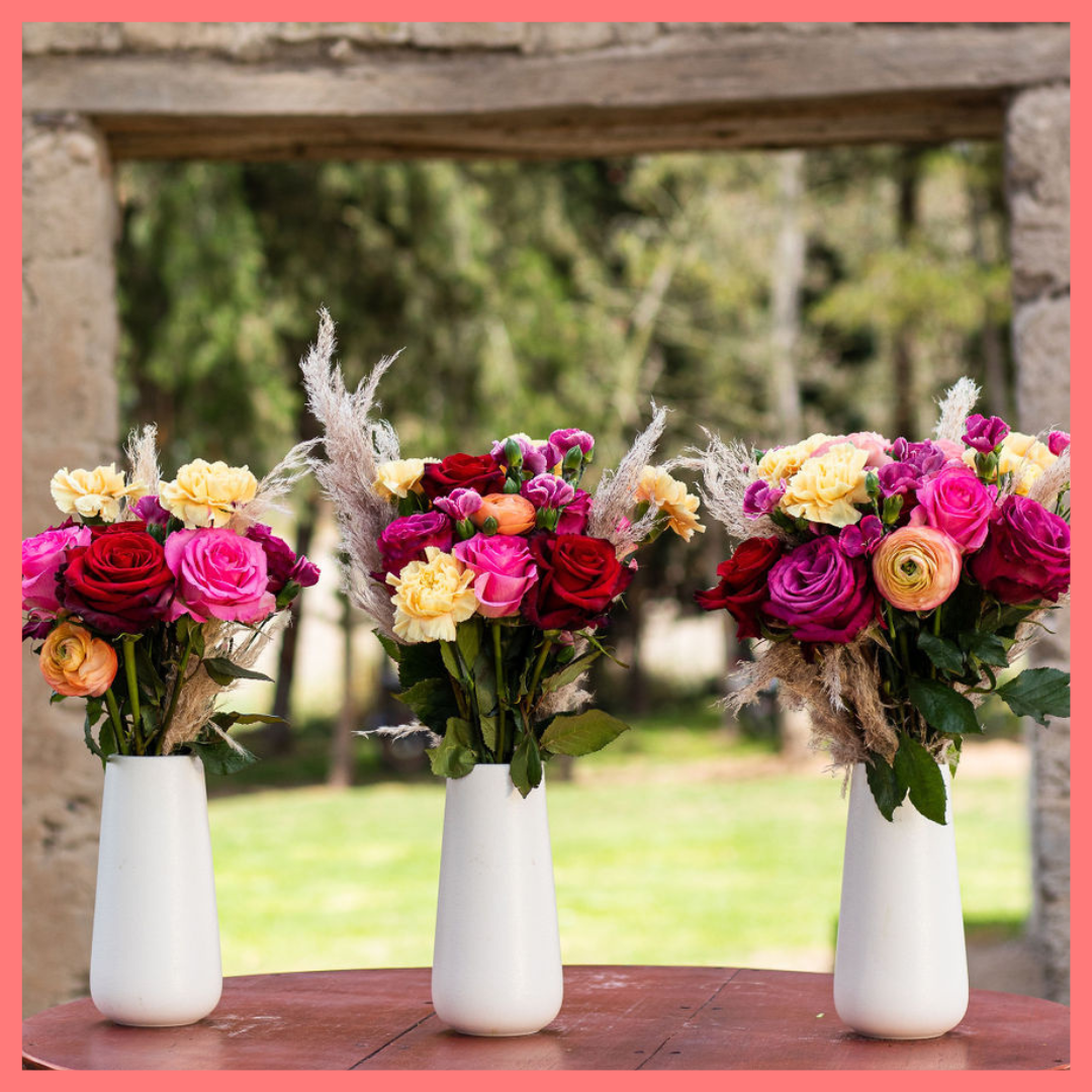 The Family Memories bouquet includes mixed stems of roses, ranunculus, carnation, solomio, and dried pampas! 