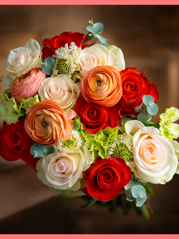 The Good Times Roll bouquet includes 38-42 mixed stems of roses, ranunculus, scabiosa, solomio, and eucalyptus. Vase included. Please note that as flowers are a live product, colors and varieties may slightly vary from the photos shown to provide you with the freshest and most beautiful bouquet.