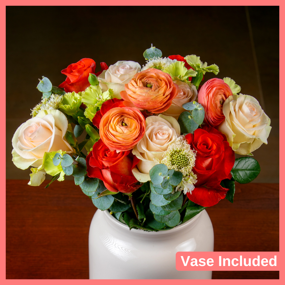 The Good Times Roll bouquet includes 38-42 mixed stems of roses, ranunculus, scabiosa, solomio, and eucalyptus. Vase included. Please note that as flowers are a live product, colors and varieties may slightly vary from the photos shown to provide you with the freshest and most beautiful bouquet.