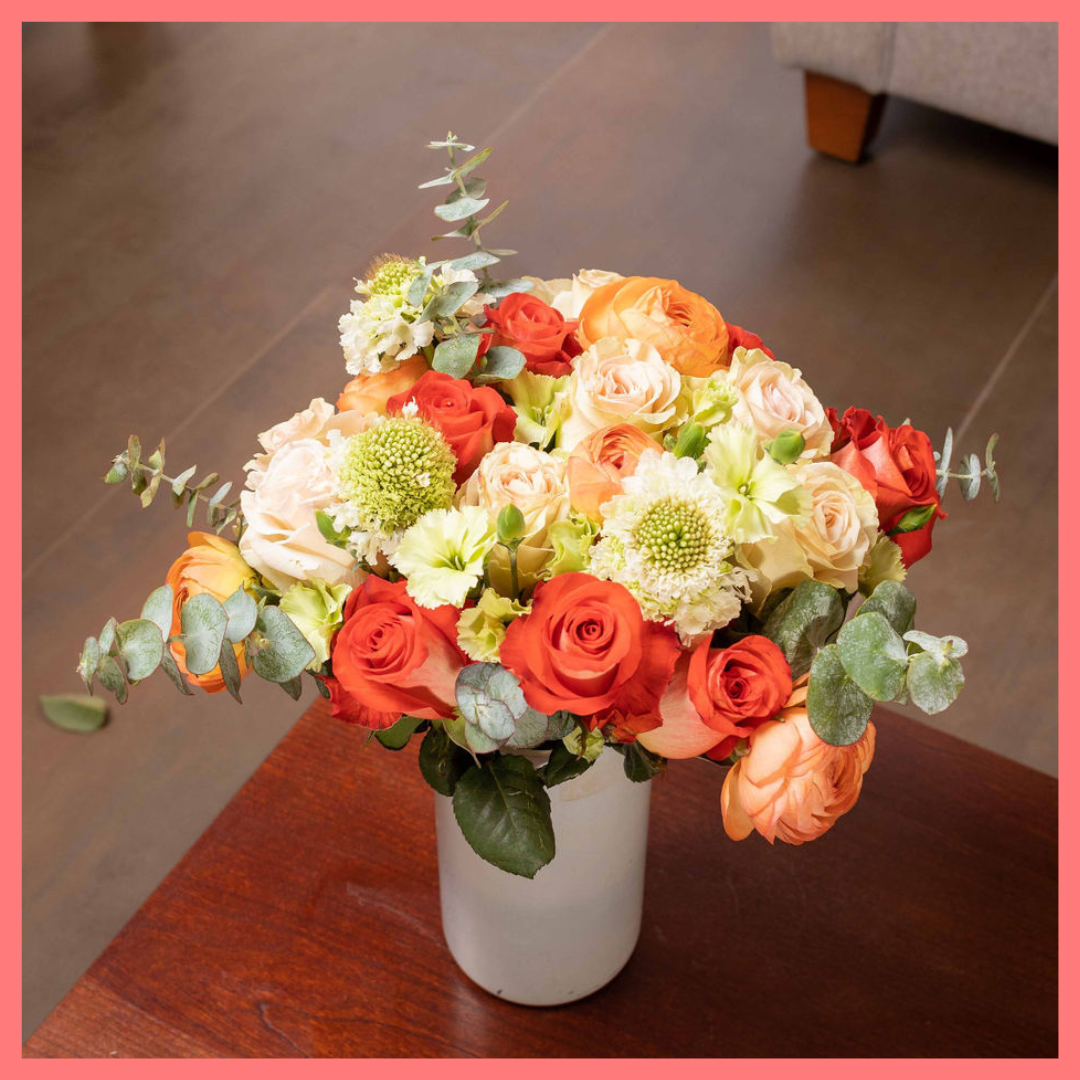 Order the Pretty and Festive flower bouquet! The Pretty and Festive bouquet includes mixed stems of roses, ranunculus, scabiosa, solomio, and eucalyptus. The flowers will be shipped directly from the farm to you!