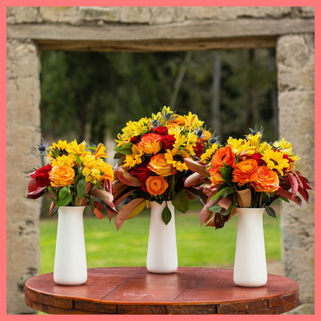 The Pumpkin Nice bouquet includes mixed stems of sunflowers, ranunculus, roses, alstroemeria, photinea, and eryngium. Please note that as flowers are a live product, colors and varieties may slightly vary from the photos shown to provide you with the freshest and most beautiful bouquet.