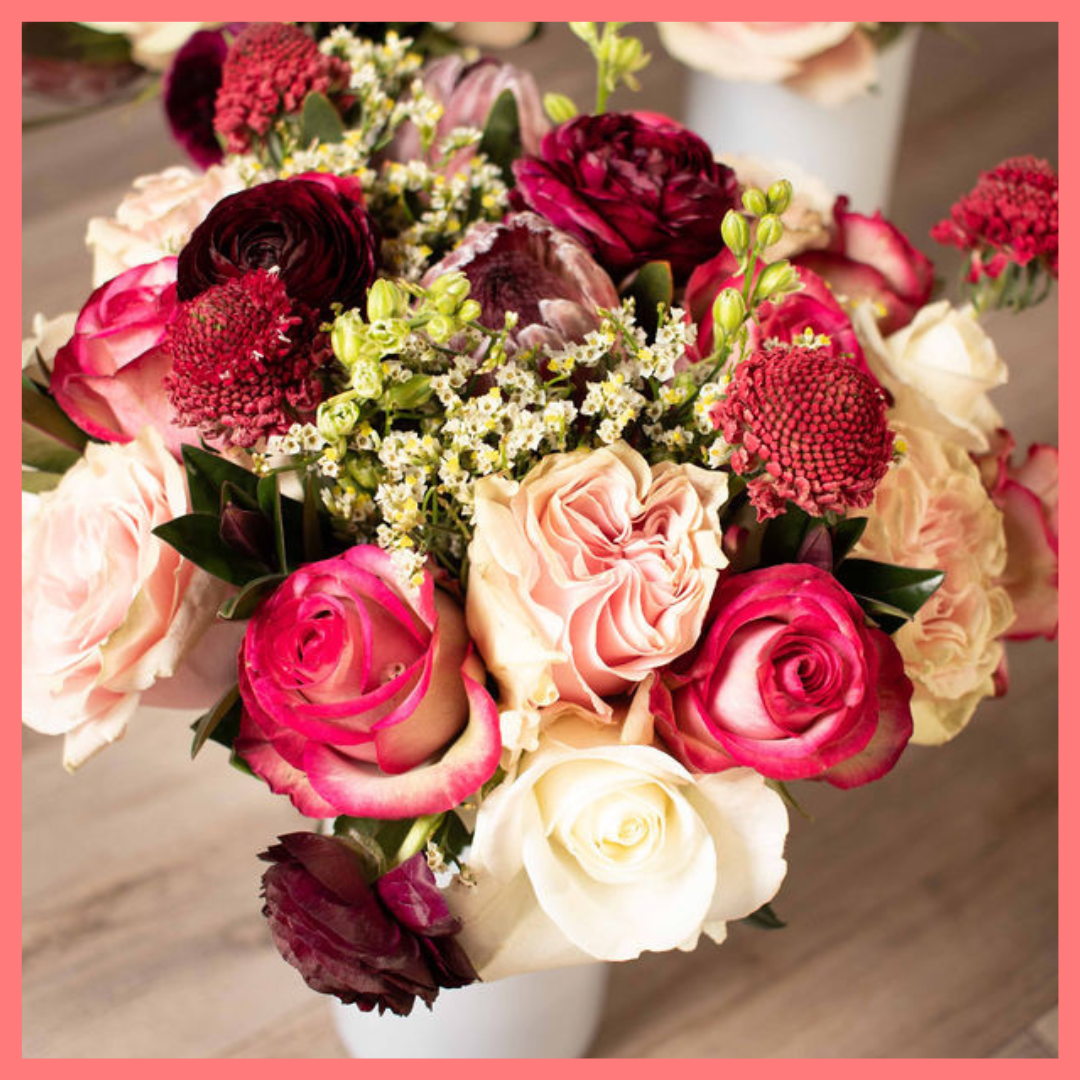 Order the Roses and Snowflakes flower bouquet! The Roses and Snowflakes flower bouquet includes roses, hebes, scabiosa, larkspur, protea, and limonium. Please note that as flowers are a live product, colors and varieties may slightly vary from the photos shown to provide you with the freshest and most beautiful bouquet.