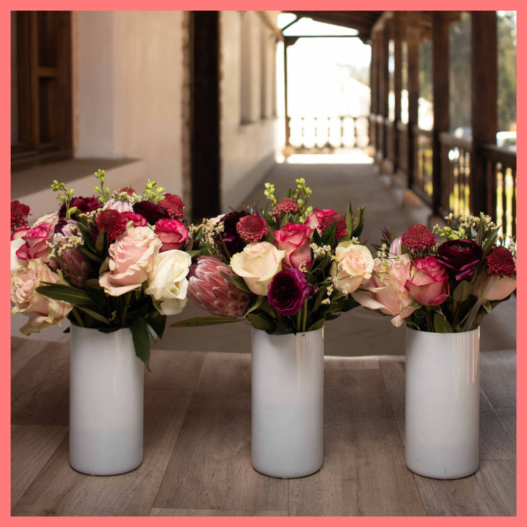 Order the Roses and Snowflakes flower bouquet! The Roses and Snowflakes flower bouquet includes roses, hebes, scabiosa, larkspur, protea, and limonium. Please note that as flowers are a live product, colors and varieties may slightly vary from the photos shown to provide you with the freshest and most beautiful bouquet.