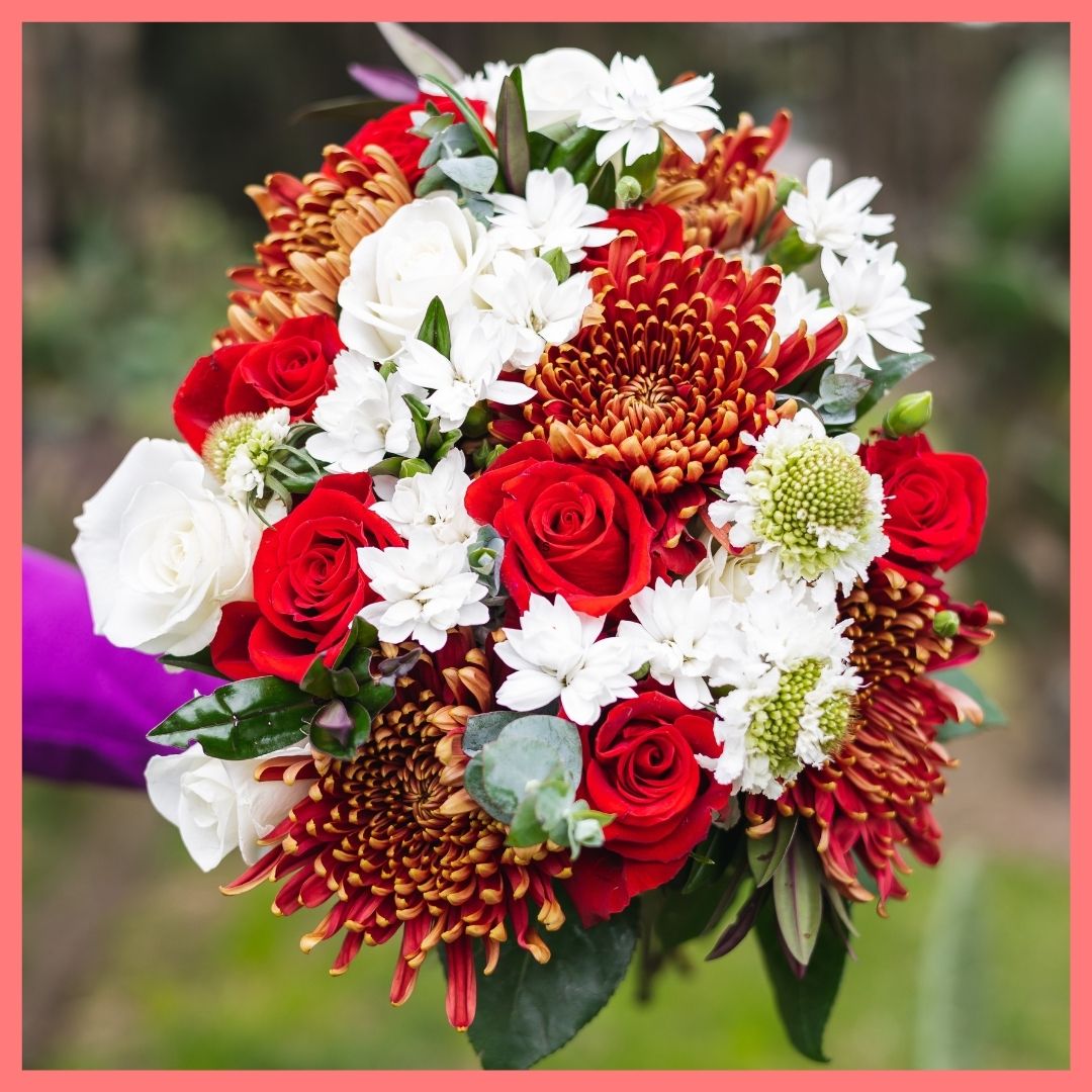 Order the Jingle Jingle Christmas flower bouquet! The Jingle Jingle flower bouquet includes mixed stems of roses, scabiosa, chrysanthemums, solomio, hebes, and eucalyptus. The flowers will be shipped directly from the farm to you!