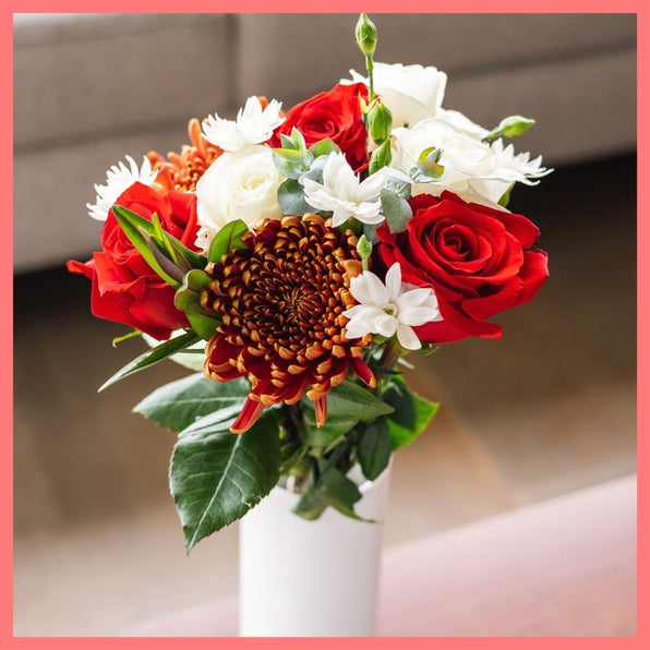 Order the Jingle Jingle Christmas flower bouquet! The Jingle Jingle flower bouquet includes mixed stems of roses, scabiosa, chrysanthemums, solomio, hebes, and eucalyptus. The flowers will be shipped directly from the farm to you!