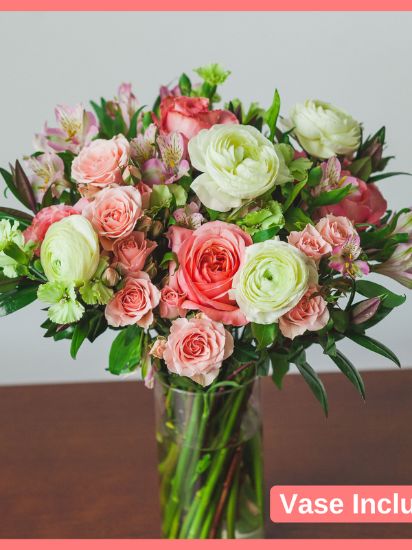 Order The 365 flower bouquet. The 365 bouquet includes 38-40 mixed stems of roses, spray roses, solomio, alstroemeria, hebes, and ranunculus. Vase included. Please note that as flowers are a live product, colors and varieties may slightly vary from the photos shown to provide you with the freshest and most beautiful bouquet.