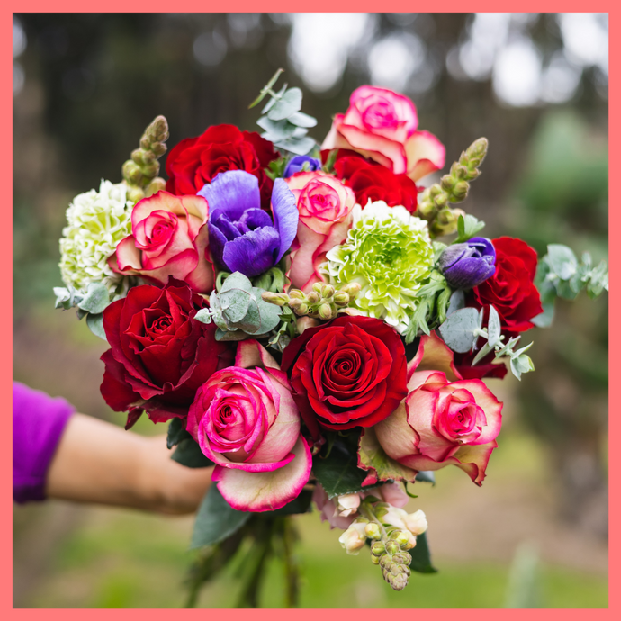 The Growers' Choice - Christmas Flower Bouquet includes mixed stems of lilies, calla lilies, gerbera daisies, hypericum, schlefflera, chrysanthemums, and eryngium. Please note that as flowers are a live product, colors and varieties may slightly vary from the photos shown to provide you with the freshest and most beautiful bouquet.