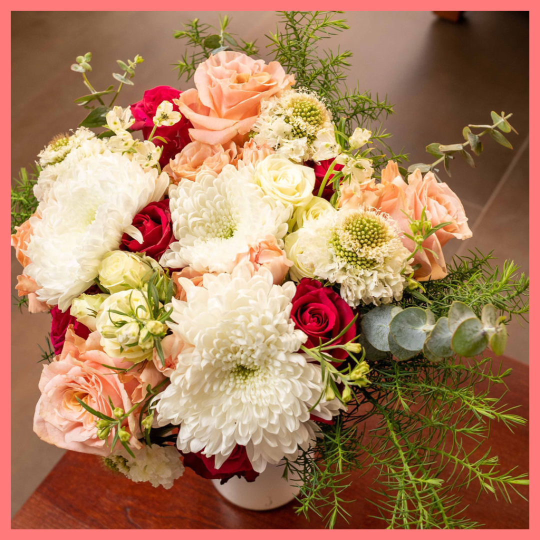 Order the Winter Wonderland flower bouquet! The Winter Wonderland flower bouquet includes roses, carnation, scabiosa, chrysanthemums, delphinium, romero, and eucalyptus. Please note that as flowers are a live product, colors and varieties may slightly vary from the photos shown to provide you with the freshest and most beautiful bouquet.