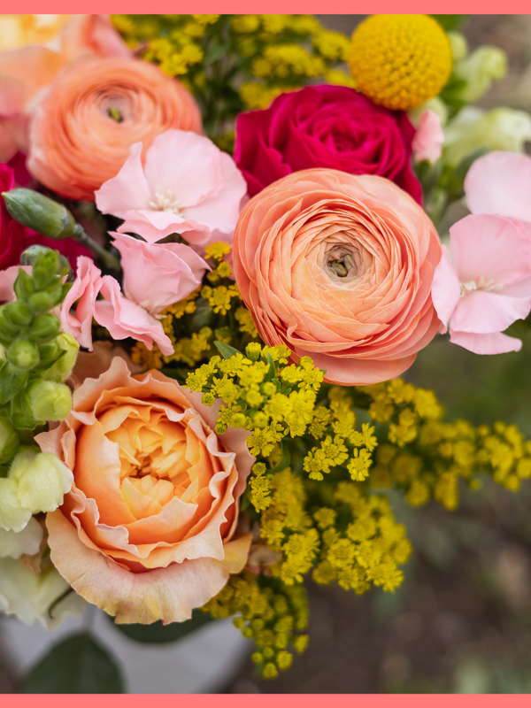 The Birthday Wish bouquet includes mixed stems of ranunculus, roses, solidago, snapdragons, solomio, and craspedia. Please note that as flowers are a live product, colors and varieties may slightly vary from the photos shown to provide you with the freshest and most beautiful bouquet.
