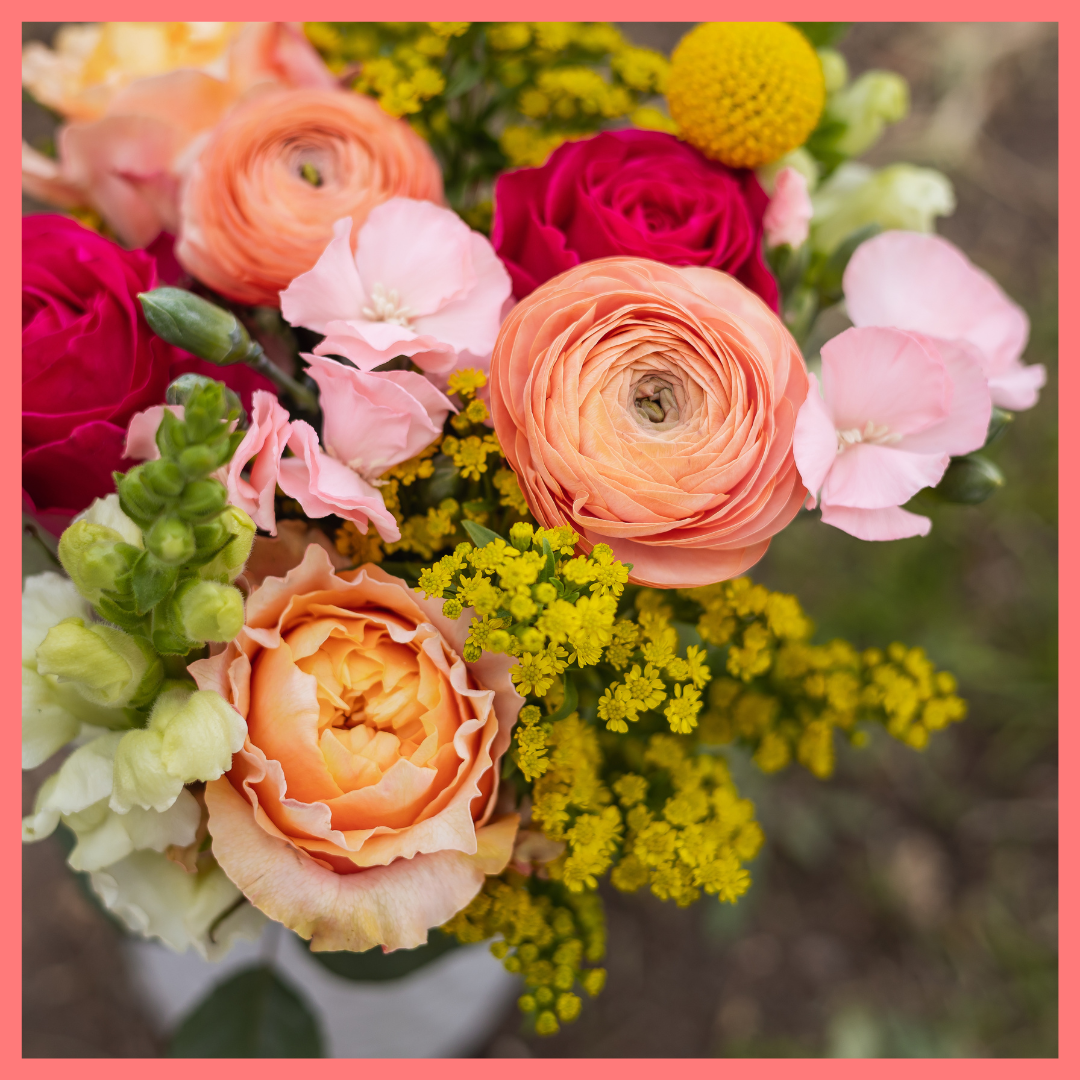 Order the My Dear flower bouquet. The My Dear bouquet includes mixed stems of ranunculus, roses, solidago, snapdragons, solomio, and craspedia. Vase included. The flowers will be shipped directly from the farm to you!