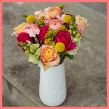 Load image into Gallery viewer, The Birthday Wish bouquet includes mixed stems of ranunculus, roses, solidago, snapdragons, solomio, and craspedia. Please note that as flowers are a live product, colors and varieties may slightly vary from the photos shown to provide you with the freshest and most beautiful bouquet.
