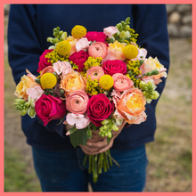 Load image into Gallery viewer, The Birthday Wish bouquet includes mixed stems of ranunculus, roses, solidago, snapdragons, solomio, and craspedia. Please note that as flowers are a live product, colors and varieties may slightly vary from the photos shown to provide you with the freshest and most beautiful bouquet.
